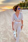 This is a very versatile two piece, you can wear them together or as separate pieces. The pants are soooo comfy and flowy. I did have to have the top taken in a little as it was a little loose at the busy area and made my boobs look flat and saggy. Also had the pants hemmed just a tad since Im a shorty. - Camille C.