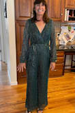 I really liked this jumpsuit because I wanted something fun and classy for a wedding rehearsal dinner.  I think this jumpsuit fit the bill!   The material was light and swingy.  I felt it was a bit short for me but I wore a low heel and it was fine. - Laura W.