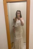 I got this to start my wedding dress shopping adventure, and it really is beautiful. However, the shoulder over lay is a little too long for my torso and cut at a weird spot. It's gorgeous, well made dress, just not for me! - Rebecca C.