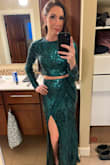 This dress was absolutely stunning, and so elegant. The inside fabric was so soft and the sequence didn't irritate anywhere. I was hesitant with it being a two-piece but the proportions were all spot on. Size up if you're unsure on size. - Kelly M.