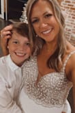 This dress is absolutely stunning and fit perfectly! True to size! We had a small wedding but this dress is made beautifully that would totally be perfect for a large wedding as well! - Stephanie C.
