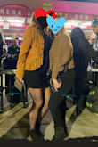 I wore this to a concert with patterened fish nets and boots, colorful jacket. Love. Even with my curves it masked great. I love it. Very flattering. - Ciel M.