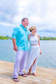 It was beautiful on and fit like a charm!! Little bit long but it can easily be altered! Perfect for our beach wedding! - Amber R.