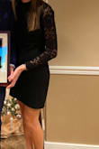 This dress is fitted, but works well on a tall body.  Hugs the right places. Sleeves are long!  Very elegant! - Brittney S.