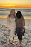 I love This dress!  It fit me perfectly. It's not too tight and hugs in all the right places on my body.  I wore This for my family photos on the beach and it looked so pretty against the backdrop of oceans/cliffs of SoCal. The color is a beautiful ivory color. I was Worried that it might be too white, but its not!  The slit on the leg gives just enough to keep the dress sexy but also classy. 
I wore this with short white booties and it was cute!  You could wear this with any type of bootie/heel and maybe even a sneaker!   Also worth mentioning it is a warm dress and so comfortable.  
I will Be wearing this dress a lot for all the holiday stuff this month!  
Buy this dress! You will not regret it. - Kathleen C.