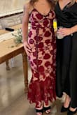 I wore this to a wedding.  It's beautiful and I received so many compliments.  That being said, I did take it for alterations as the chest was far too large and gapped on my small chest. The seamstress also took in the sides for me.  It was comical to try to get in and out of a vehicle as there's not much forgiveness in the dress.  I am 5'3 so it was a little long but I didn't mind. - Emily M.