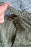 I loved this sweater but unfortunately Lulus placed the tag in a bad area. The fabric got snagged and started unraveling right away. The sweater is ruined and I cannot wear it now. - Ashley J.