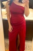 Color is stunning, cut is great, it came with a hole in the side seam -unfortunate, but fixed when I had it hemmed. Slit is very revealing, so the tailor threw a stitch in to close it a bit. Over all, I'd recommend this dress. - Emily W.