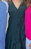 I loved wearing this dress. The rich color green and detailed fabric are romantic and flirty and the cut of the dress hugs the behind a little to show off your perfect curves in a classy way. The design of this dress stays wrapped unlike some true wrap dresses that sometimes need to be tightened, which I thought was nice because I didn't have to worry about the dress coming undone. The only drawback was that I felt the dress was a bit too large on the top portion so I had to pin it in a couple of places to prevent my girls from showing too much. I am not small busted (average-ish I guess at 36c) but I felt this dress would better suit a larger busted beauty. The pins did the job and I felt comfortable and pretty in the dress and I'm glad to have it as an addition to my closet. - Sonya F.