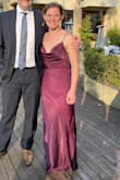 Wore this for a formal wedding, but I kept thinking about how many different events this dress would work for! The fabric is light (though not at all see-through) so don't expect to be warm. Length was a little long for me in 3-inch heels, so I would hem by an inch before my next event. This a dress where you should get your true size - I tried the xs and the small and found that the xs fit, but it didn't lay quite right, while the small draped really well. Careful not to make the straps too tight either for the same reason. If you want a little more security, I recommend some wardrobe tape to keep the fabric close to your bust at the neckline. - Olivia D.