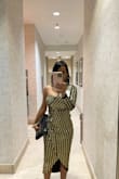 I got lot of compliments from this beautiful dress. Fits perfect and it's comfortable but it doesn't stretch so I would recommend a size up. - Roxana B.