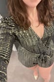 This romper is awesome. I got it for NYE and I'm so excited to sparkle in it. Minus one star because the sequins fall off easily. - Rebekah B.