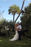 I usually consider myself a small, went with the XS after reading reviews. Came just in time for my dreamy beach wedding. Fit snug but perfect. Loved that it had a little train and was fully lined, even held up for a dip in the ocean after our ceremony. - Abby D.