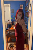 I purchased this dress for a wedding in February, and I've been dreading even having to find a dress. I really thought this was going to be the dress I returned for being too "revealing", but people, it truly is very flattering. I also originally thought the leg slit was going to be "too sexy", but it's the PERFECT amount of sexy and still somewhat modest. If you're having doubts about this dress, don't!!! Buy it!! The material is a little stretchy, which is good because I DO plan on eating at the wedding. For me personally, I plan on wearing Spanx but could work without. I'm wearing the top part a little too high up in the picture. If you have a smaller chest and are comfortable not wearing bras, it's possible to get away without one or padding. I can't stress enough how much I love this dress. I've never been more confident in a dress before. - Cait C.