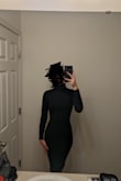The fabric is pretty thick and comfy. The dress is nice and snug. It hit right below the knee. I was worried the sleeves would be too long, but they were perfect. - Kana H.