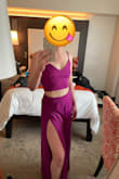 I love the bright color and versatility of this jumpsuit! The fit is flattering and the light material makes the outfit comfortable on a hot summer day. The slit goes all the way up and can be exposing when you sit, though. - Julia K.