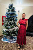 It fits perfectly on my body but just a little bit long for me. I love the look of the dress overall. I wore it a Christmas Party and it was perfect, received tons of compliments that they like my dress. It was kinda expensive though and wish it was included in the 50% off sale then it would have been better. - Jo A.