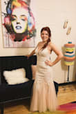 My reception was at an old building where the newspaper used to be printed so they had a lot of antiques to decorate with. The bottom layer of this dress is a champagne color so it gives an antique/cream appearance under the tulle layers which went well with the decor. If you're busty you'll want to size up. I ended up going to a tailor to let my dress out in that area and replaced the tulle straps with something a little more comfortable. I had so many compliments and I just felt absolutely beautiful in this dress. Lulus truly is making beautiful, good-quality wedding dresses that are affordable. I was able to get this dress for my reception and another for my ceremony and still save a ton of money compared to the dresses I tried at a wedding boutique. - Tori M.