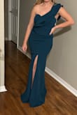 I ordered this as a bridesmaid dress and for the price I'm not mad. HOWEVER, the color of this dress is WAY darker than it's showing in the advertisement. The shoulder strap length is excessively large and there was probably a mistake in sewing the slit in the dress I received because it creates a weird ripple. Long story short, I can't return it, I can't wear it to the wedding, and I'd have to pay more in alterations to fix it than I did to buy it. Also, if you have big hips go up a size. - Taylor Y.