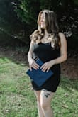 The perfect little black dress. Used it for grad pics and got a lot of compliments. The material is thick enough that I didn't have to wear a bra. I do wish the straps were adjustable though. - Shelby W.