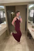 Ive always shied away from mermaid style dresses because I'm self conscious about my inverted hip shape but decided to go outside my comfort zone and try this dress. I LOVE IT! I wore Spanx shorts under to smooth out a bit and am amazed how this dress looks on me. The fabric is stretchy but thick so it smooths out a lot. I do think I should have gone a medium instead of a small for a little more room but I took the do not remove tag off accidentally, oops. I wore it to my mom's holiday party and was getting compliments all night. I want to get this dress in a couple more colors, it's great! I'm 5'6" and wore it with 4" heels but I could have gotten away with wearing a shorter heel and still not had to hem. - Lizzy G.