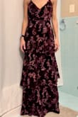 Ordered an XS, the top aspect was slightly too big. Ordered this for an out-of-town winter wedding and did not have much time for any seamstress work, so I returned it. This dress is a stretchy material, it has some give to squeeze into - but if it's too big there isn't much you can do! There is no XXS option either, so if you have a smaller bust/chest and typically wear XS tops I'd suggest ordering it in enough time to evaluate if you'll need it tailored to you! Also, it IS longer than the stated length, 53 inch 6 cm from strap to bottom; which in my case was a plus! I was afraid it would be too short, I'm not super short but I'm not super tall either. This dress hit the ground on my 5'6 body, which looked perfect with a pair of 1-inch platform heels! Overall, this dress is a fun and flattering material, perfect for fall/winter vibes. The ruffles are forgiving and the slit on the side adds a little flare to the overall look as well! - Michael M.