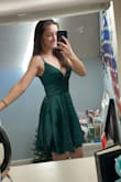 It's actually so cute. It came fast. The only issue is that it's quite wrinkly and I'm not sure how to get them out without ruining the dress. Oh well though. - Hope C.