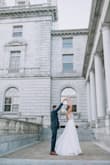 This dress is stunning! I wore this in December in 20°f weather for my wedding....it was freezing, but the dress was so worth it! The dress fit snug, but sizing up it would have been too big. Perfect length, had to do nothing to the dress. LOVE IT! More stunning in person. - Taylor P.
