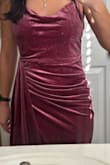 The mauve color was prettier than expected and the dress itself is soft and comfortable. I chose to return it though because it ran bigger and I found it unflattering from the side. The dress bunched up in the back and wouldn't lay smooth. I thought the ruching would hide my constantly bloated looking belly but I think maybe because of the extra looseness it just accentuated it. I'm gonna try the xs and see if that helps. - Rebecca R.