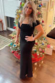 I loved this dress. I had to get it hemmed as it was definitely way too long for me. Great quality. Has a nice stretch to it. No need to wear a bra with it. Very flattering. - Dominique D.