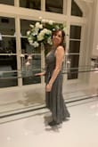 I like it; it does show your cleavage, and you can wear it in different attend - Angela P.