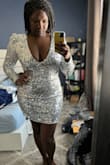 I bought this dress for a holiday party that I didnt end up going to but decided to keep it because its such a snatched look. Definitely a little short if you decide to size down but if you have a smaller chest you may want to. Boob tape is also a good idea with this dress but isnt necessary - Chelsea V.