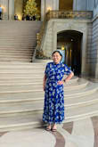 With my short stature , this midi dress was a maxi dress for me , which works out fine with me since I wore it for a day wedding . I love the blue color , its vibrant and color really pops . The garterized waistline and the dress being flowy is a plus for me . Received lots of compliments. - Lourni A.