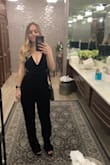 Got this jumpsuit for a winter wedding. It's very comfortable and got lots of compliments! Ordered a M and it is slightly loose (mostly in the strap area, prob could have sized down) and there's a low back, so need to wear the right bra. It's a little long, but paired well with high heels and didn't drag. I say buy it!! - Molly W.