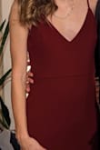 Definitely runs long. Even with almost 4in heals I needed to hem about 4-5in in order to walk appropriately. But the rest fit great with a good hug to the body. - Eileen M.