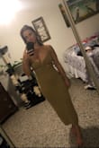 This dress is amazing, buy it, you will love. Very sexy and flattering. The dress is a unique material, sort of feels like a sweater, so it may be warmer in a hot/humid climate. - Alexandra H.