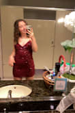 I wore this dress for my senior year holiday dance, it was the perfect length and I didn't have to worry about it riding up while dancing! The color is very much a burnt red wine color and is very pretty! I also liked the adjustable back and lace-up detailing for a more customized fit! - Melina