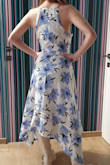 The Beautiful cut is elegant but girlish as well. The fabric is soft and light. I wear size M but size S is better this time. - Anna W.