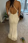 The XS fit was perfect for me. I loved the shape. Unfortunately, I returned it because I felt the sequins looked too cheap for my wedding day. - Melissa Z.