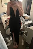 I was pleasantly surprised by this dress- it fits perfectly and doesn't seem to slip down (haven't worn it to an event yet). It looks so elegant and I love the color! It's a very dark green. I got it for a NYE party and can't wait to wear it. - Leah H.