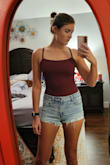 This bodysuit is VERY thin. The straps in the back are cute, but unfortunately, they are not adjustable, and it did not fit me perfectly. The fabric bunched around my chest on the side, so I ended up returning. Would probably have fit better on someone with a larger chest. - Kelsey L.