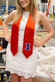 I loved wearing this dress for my graduation. I wore an M and it was a bit roomy in the chest but fit well below. If you wear it with a sash then it's hard to even notice. The quality of the dress is superb. It feels very nice to wear and I got a ton of compliments! It's the perfect length for a formal event, too. - Abby H.