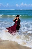 I bought this dress for my graduation photos on the beach, and it was absolutely STUNNING. The skirt twirls, it blows in the wind in the best ways for photos, and it is a very flattering,  exotic looking and flirty, yet modest, cut for mid-sized gals! - Magen S.