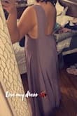 Got so many compliments on my dress. After having my 2nd baby I haven't bounced back. I wanted to get a Medium, I went with a Large last minute. It actually fit perfect!!! I wore it as a guest for a wedding. I'm 5'5 & even with a short heel it was long & had to hold it a lot so I wouldn't trip. I would like to alter for my height, but did feel like a model walking a runaway with a long dress. - Stephanie M.