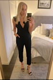 I LOVE this jumpsuit. I originally purchased in white in the spring and didnt hesitate when the black came out! Dress up or down its the freaking best!! Tall girls rejoice! - Bridgette D.