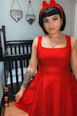 This dress fits perfect and has a very nice zipper that works really well. I got it in red. - Alejandra P.