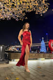 I loved this dress! It fit true to size and the shape was very flattering. Perfect length with 4 inch heels and material was super easy to steam to get out the wrinkles. Very soft fabric and I got tons of compliments. The slit on the leg was the perfect height and I was never worried about it sliding open. 10/10 - Jaedanne K.
