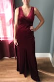 The dress was perfect except for the slit. The pictures online showed it on the left leg, but my dress had the slit directly in the middle. I was contemplating returning it, but decided to keep it since the fit was very comfortable and the color was pretty. - Twin A.