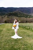 If you are thinking about buying this dress do it! I did have the length altered, as well as the sleeve length, but other than that - it was perfect straight out of the packaging. Very comfortable, even for our outdoor September wedding. - Stephanie E.