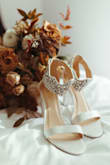 These were my wedding shoes and they were absolutely beautiful. Not the comfiest for all night, but good height for a long dress and comfortable enough for ceremony and cocktail hour. I sized up half a size and they fit perfectly. - Hannah W.